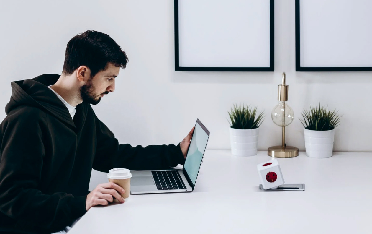 a man is working in an office setting
